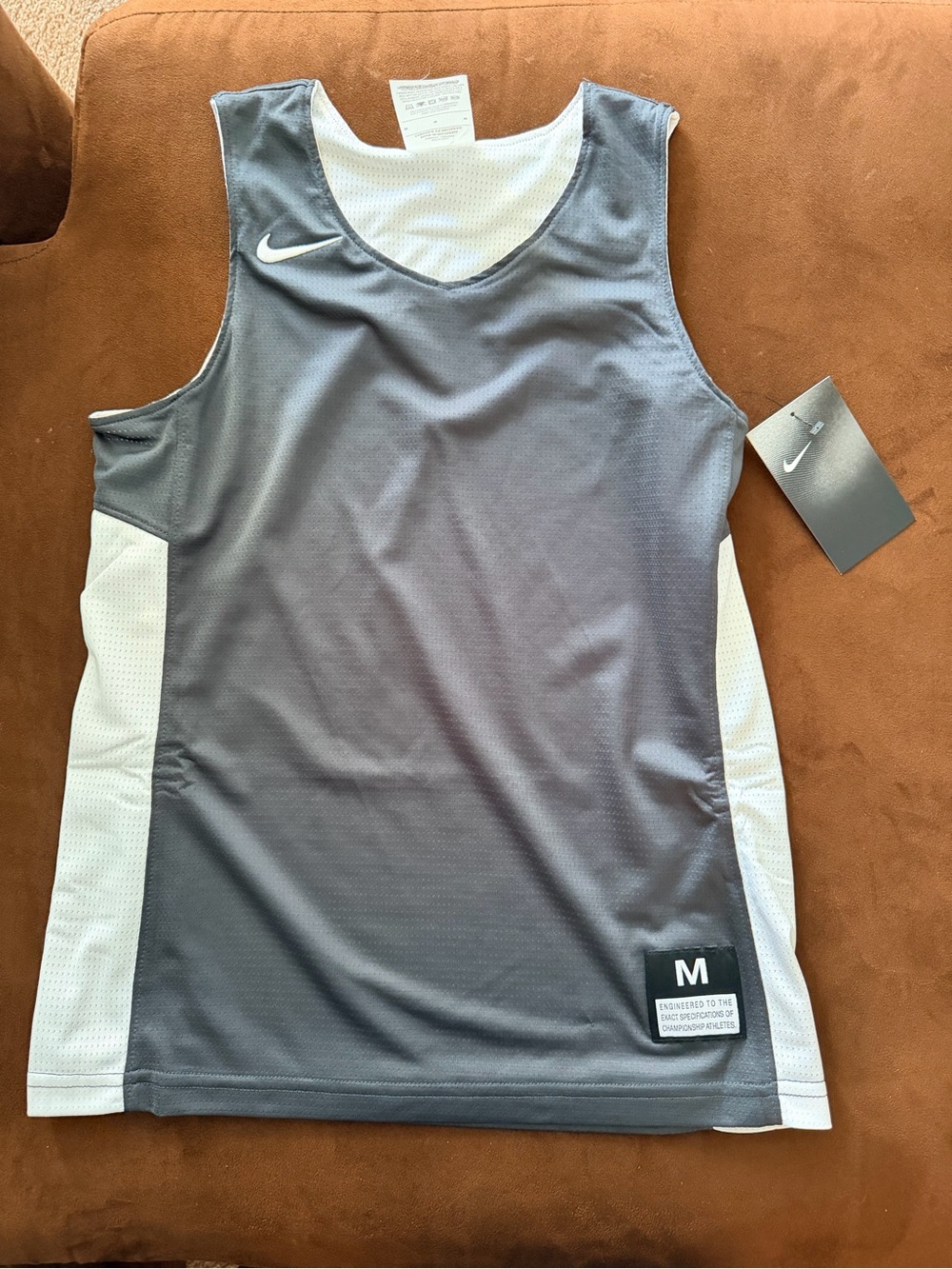 Nike Black Retail Hang Tag with Blue Price Sticker
